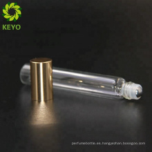 Las botellas de cristal de oro esmerilan el rollo de cristal en los envases 5ml de cristal fino ruedan en la botella alrededor de 8 ml de la botella del tubo para el perfume